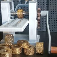 Grabadora a rodillo para cinturones