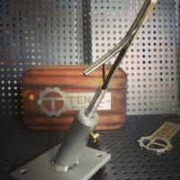 Pinza y base ojotera